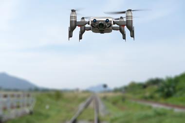drone near train tracks