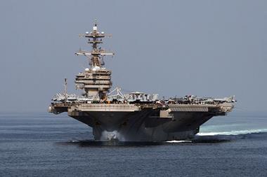 The aircraft carrier USS George Bush transitst hrough the Strait of Hormuz
