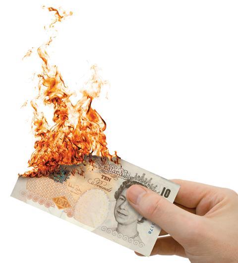Money cash fire hand