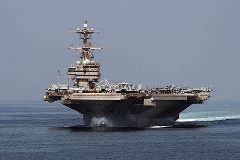 The aircraft carrier USS George Bush transitst hrough the Strait of Hormuz