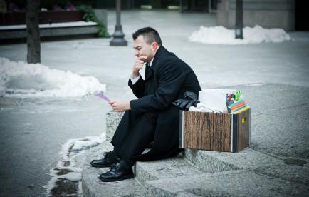 city worker depressed fire lay off redundancy elimination Istock