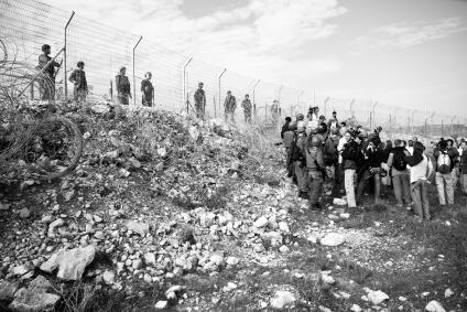 Israeli soldiers meet Palestinian demonstrators